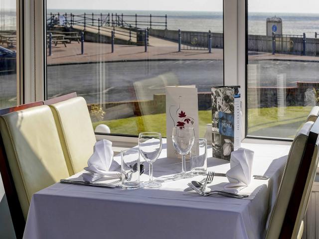 table with a view | Stade Court Hotel